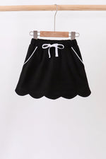Black scallop hem bow skort