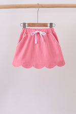 Deep pink scallop hem bow skort
