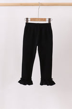 Black ruffle pants