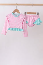 Pink sailboat print ruffle rashguard set